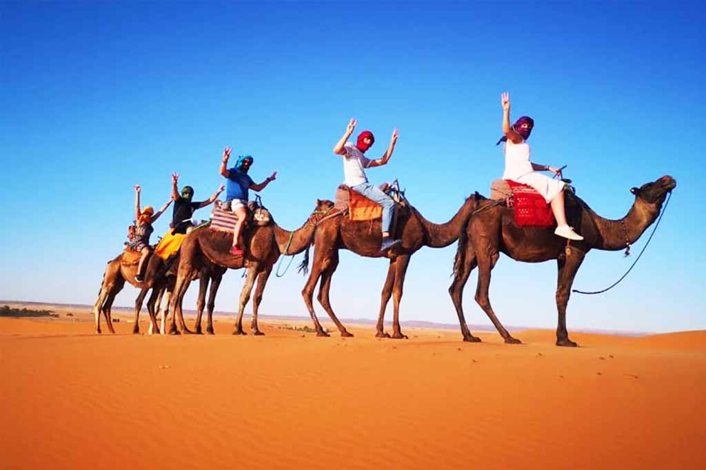 Group of friends in the dunes