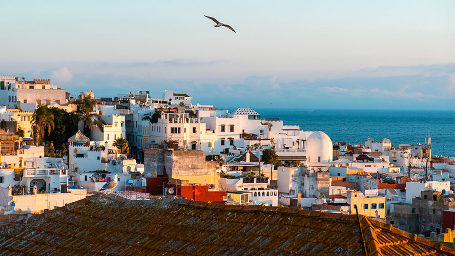 View of Tangier port with the blue sea and white buildings